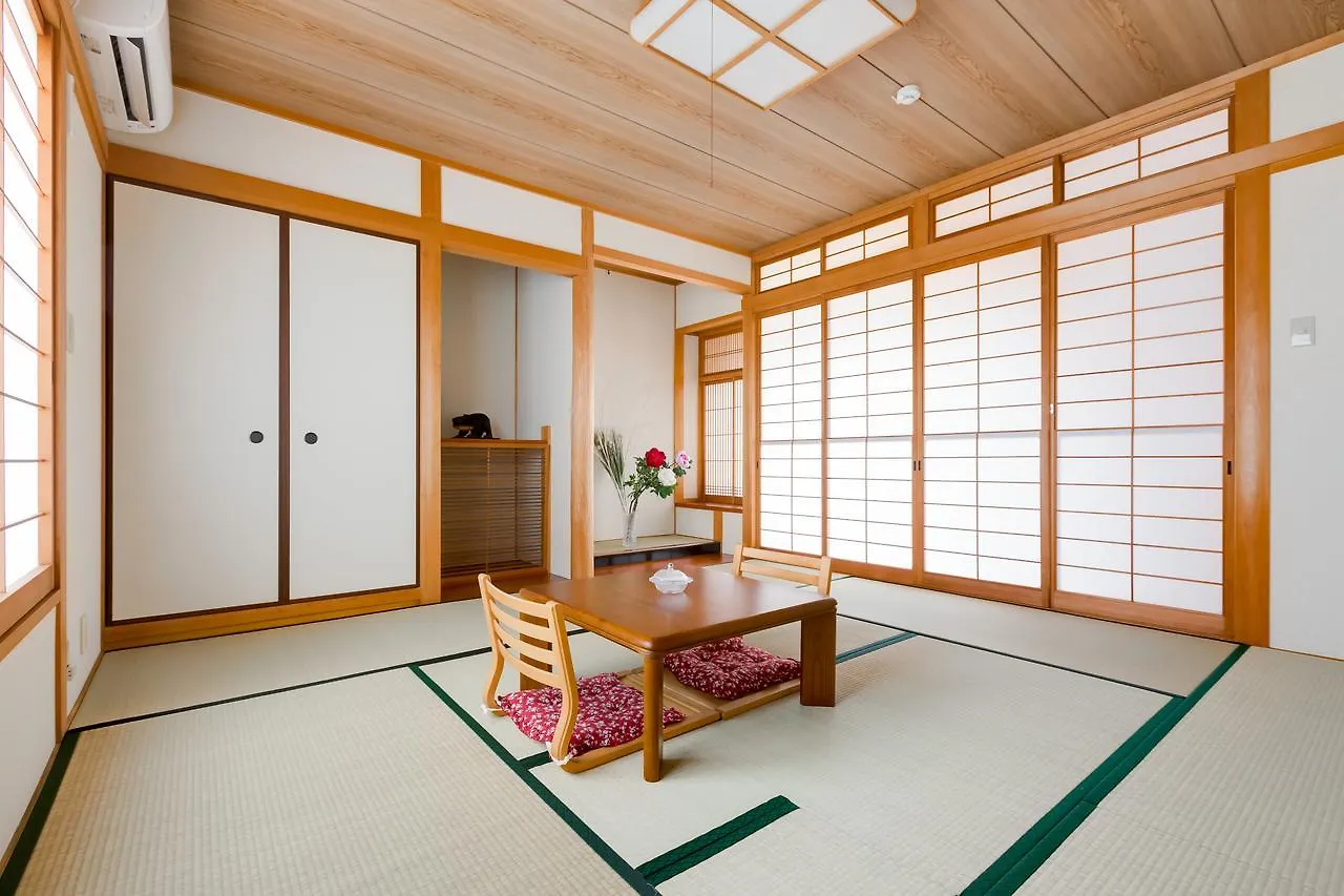 Guest house Plus 9 Station Inn Izumisano Japan